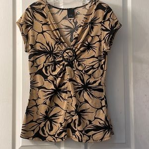 Tan and black shortsleeved v neck palm print blouse size medium